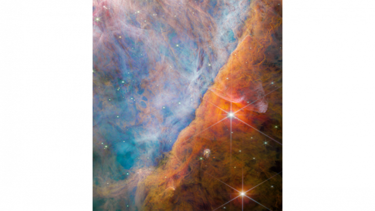 Η εικόνα δείχνει ένα μέρος του νεφελώματος του Ωρίωνα γνωστό ως Ράβδος Ωρίωνα (Orion Bar), όπου υπεριώδες φως αλληλεπιδρά με πυκνά μοριακά νέφη.