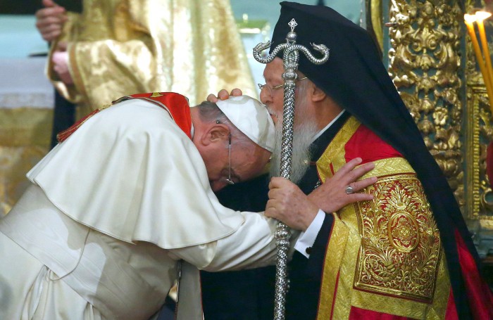 Ecumenical Patriarch Bartholomew I of Constantinople (R) blesses Pope Francis during an Ecumenical Prayer in the Patriarchal Church of Saint George in Istanbul November 29, 2014. Pope Francis began a visit to Turkey on Friday with the delicate mission of strengthening ties with Muslim leaders while condemning violence against Christians and other minorities in the Middle East. REUTERS/Tony Gentile (TURKEY - Tags: RELIGION)